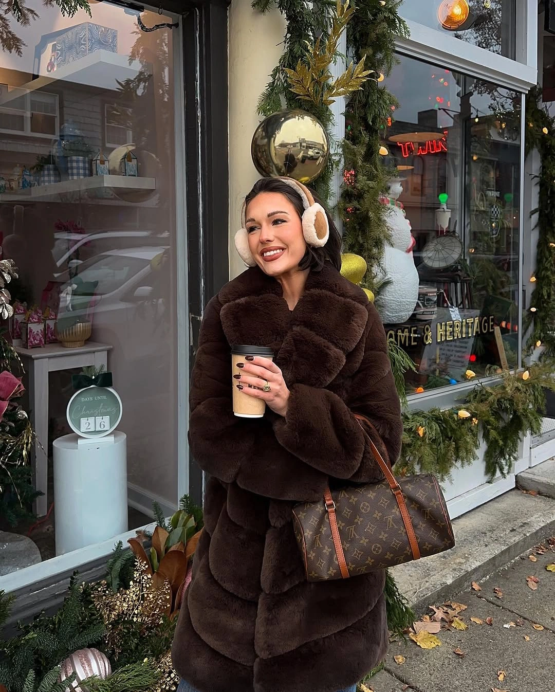 Dark plush brown coat with earmuffs and large tote