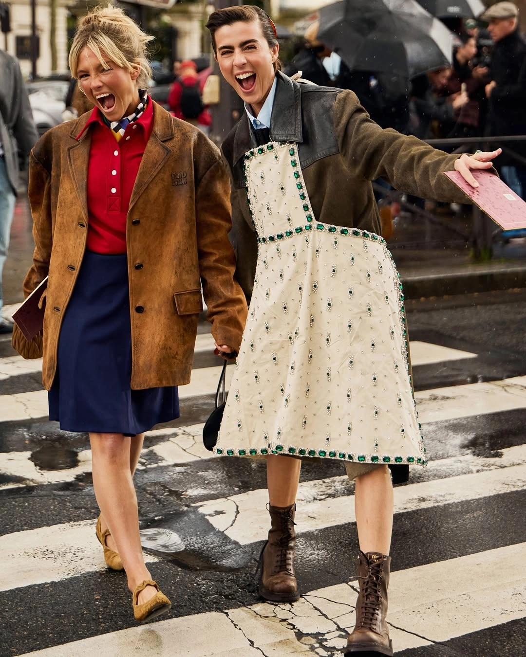 Two rainy crosswalk outfits with brown jackets and school-uniform details
