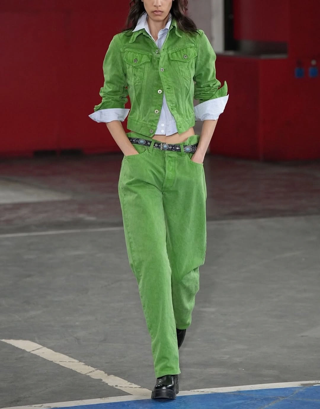 Bright green jacket and pants with pale blue shirt