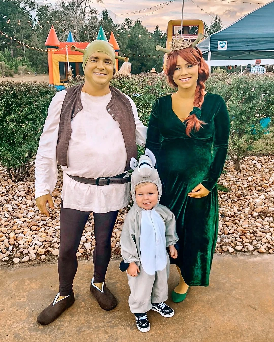 Green and tan family costumes with tall pointed hats
