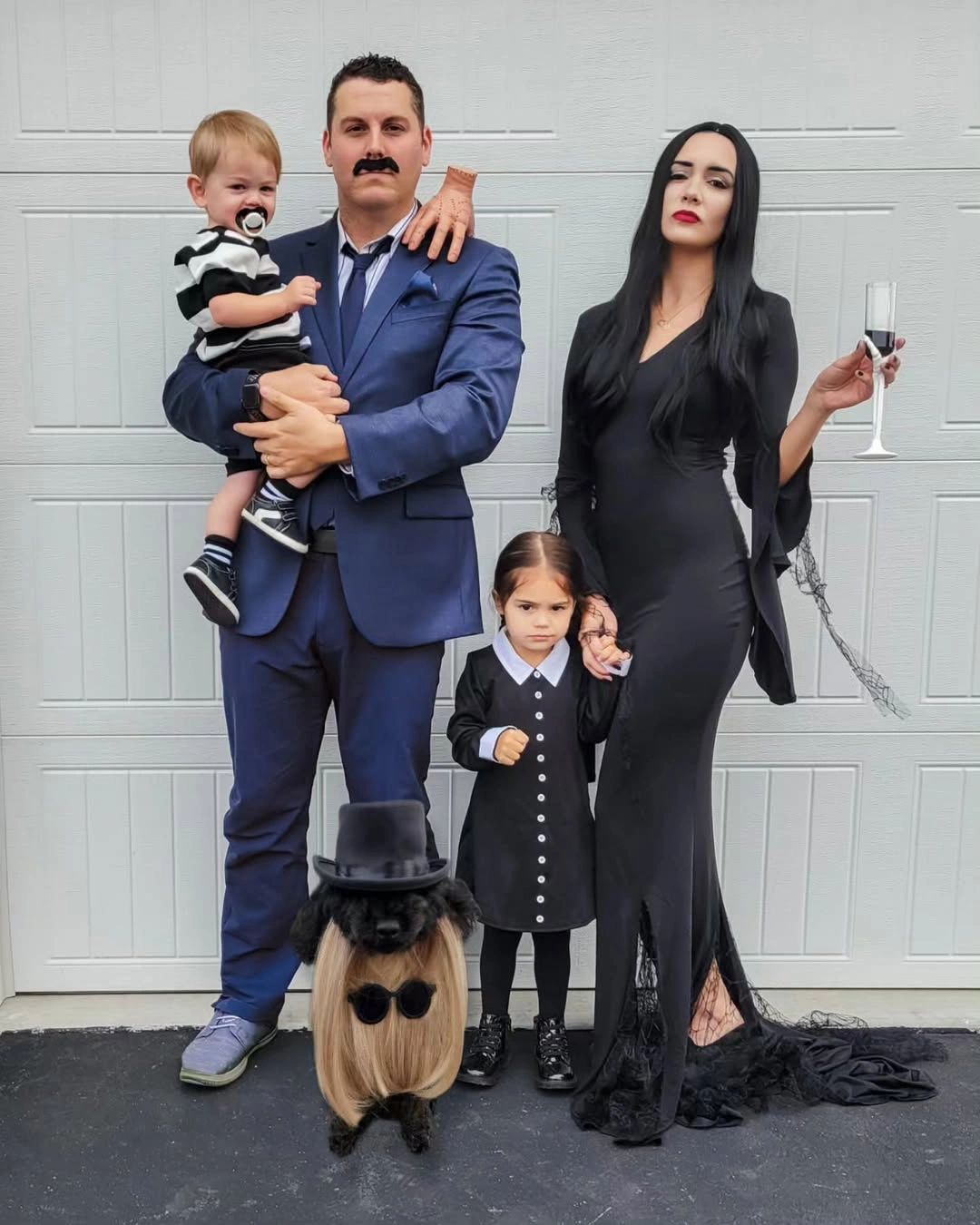 Navy pinstriped family Halloween costume with dog accessory