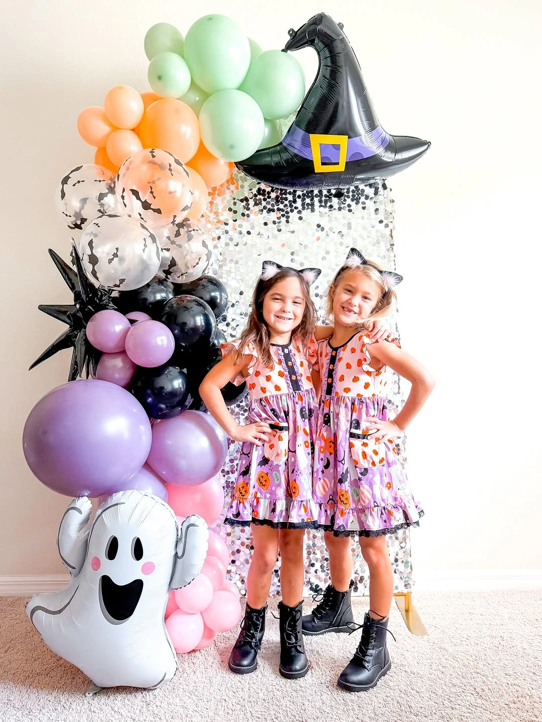 Matching light printed dresses with dark shoes for girls