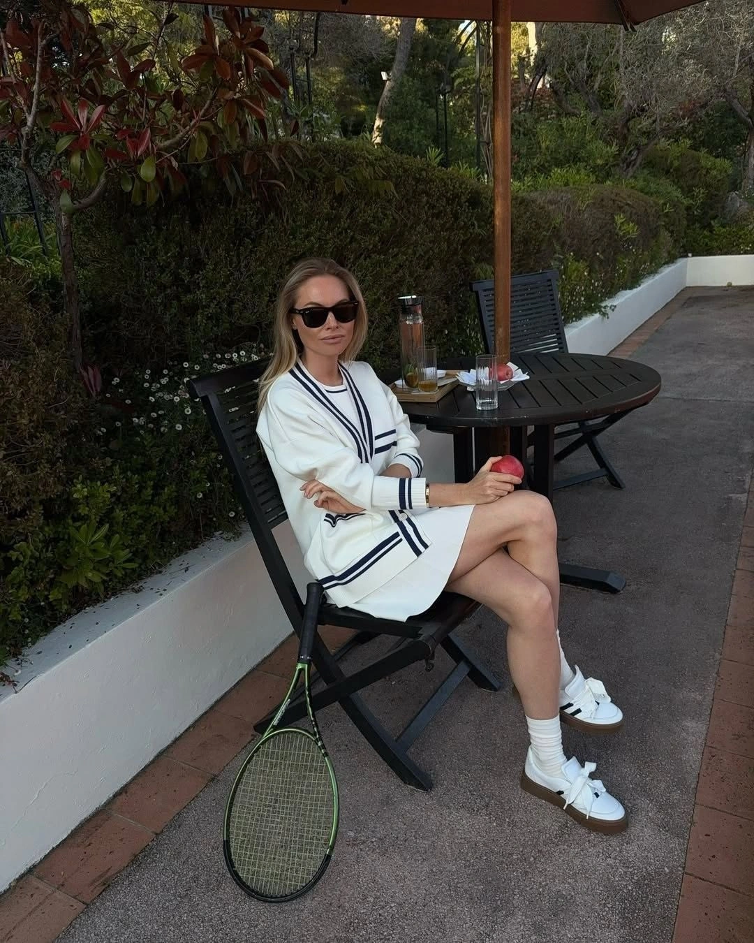 White cardigan with navy stripes and platform sneakers by racket