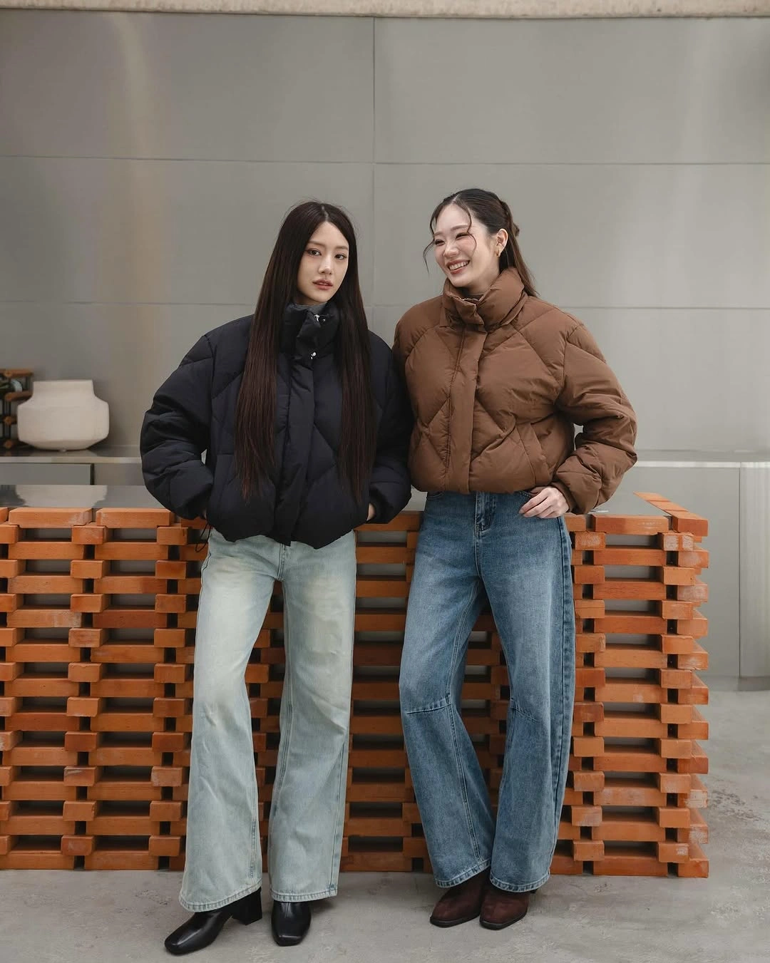 Black and brown cropped puffers with wide jeans