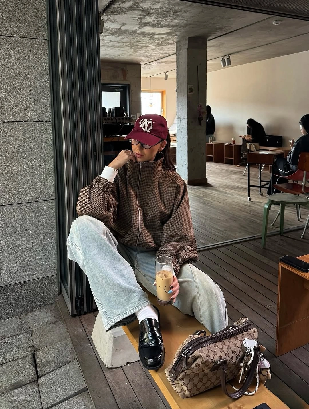 Brown check high-neck jacket with wide light jeans