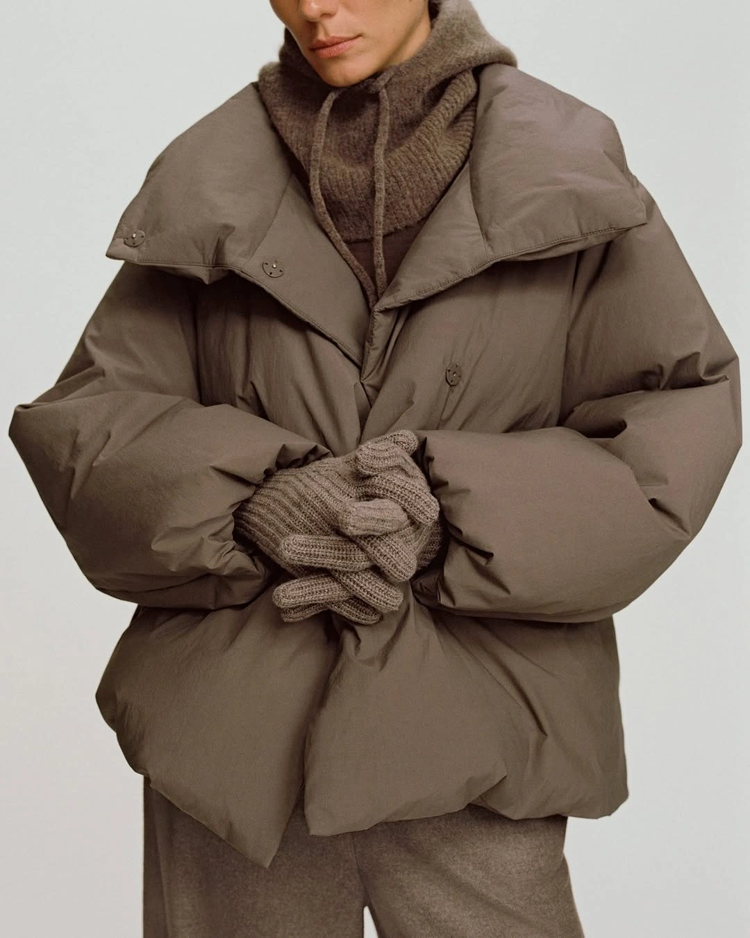 Taupe oversized puffer with hooded knit layer and gloves