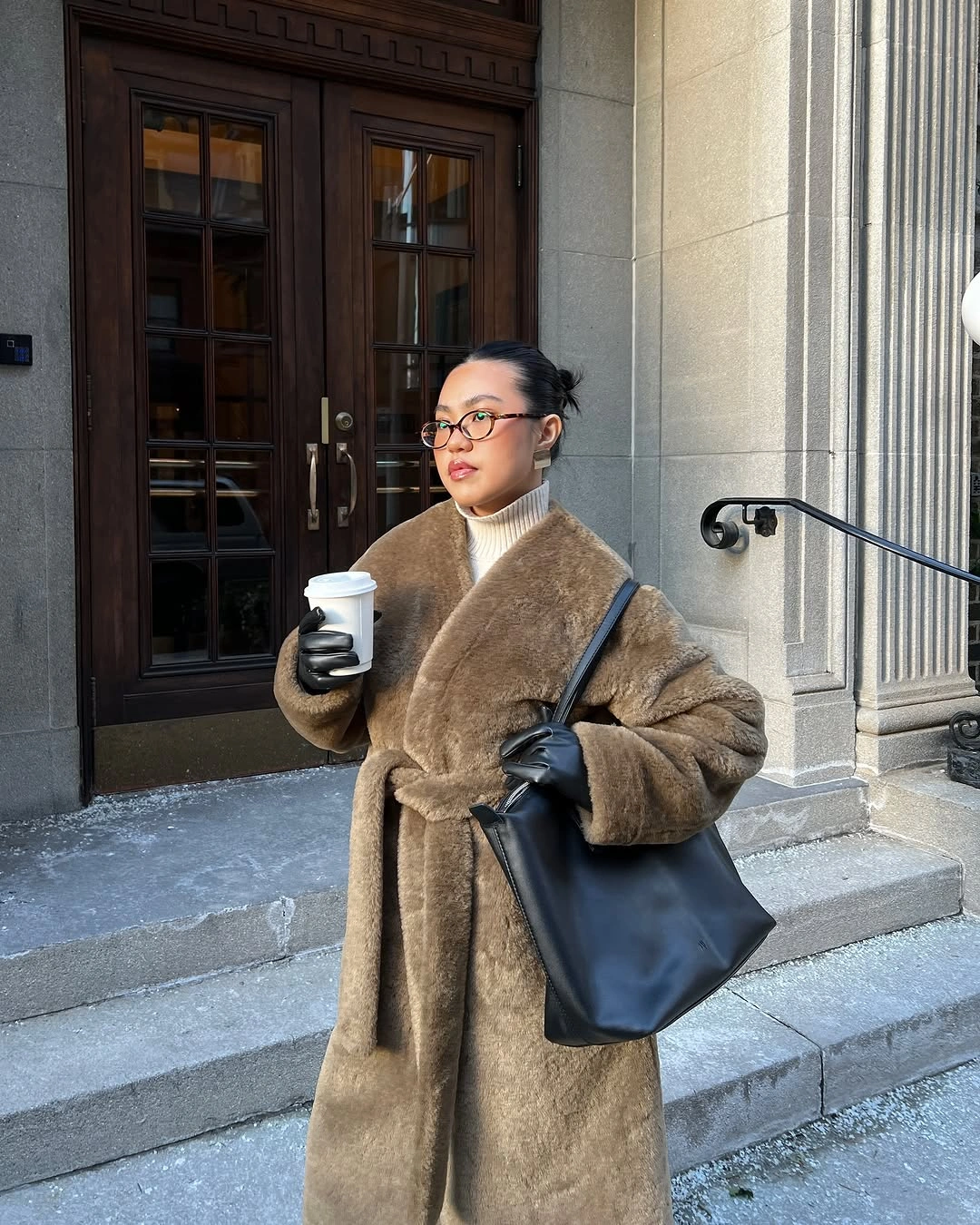 Taupe belted plush coat with cream top and black tote