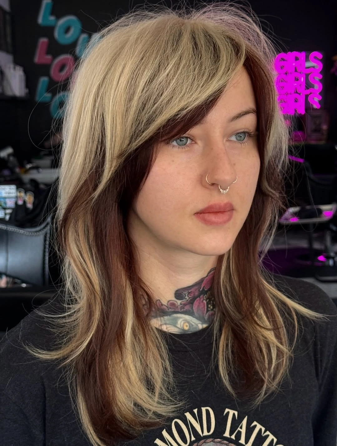 Shoulder length blonde waves with dark side underlayer