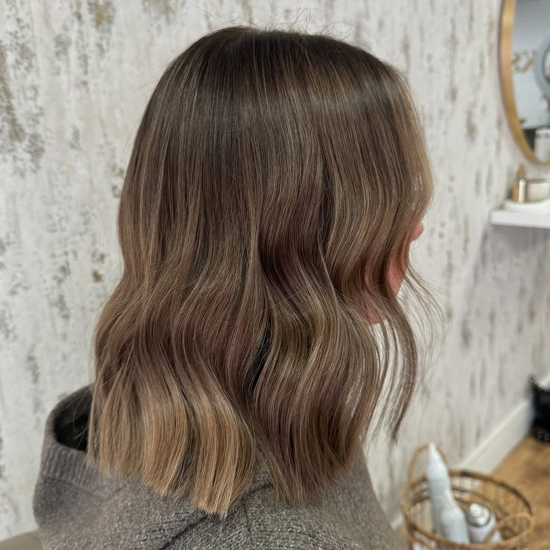 Shoulder length cool brown lob with beige blonde ribbons