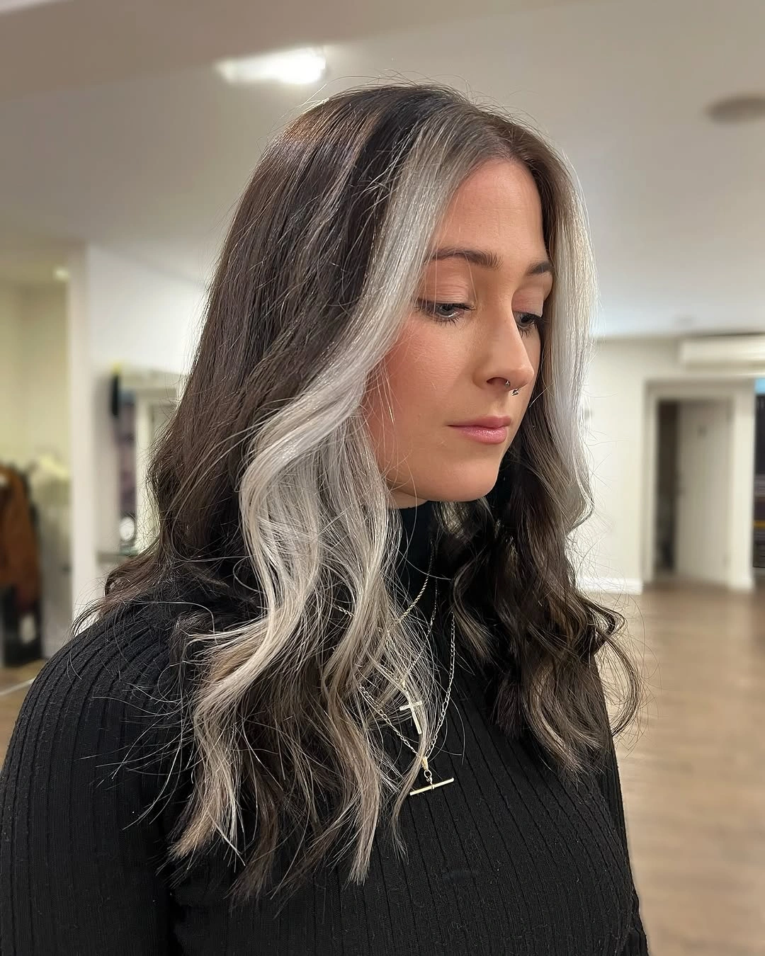 Long dark waves with paired silver face framing sections