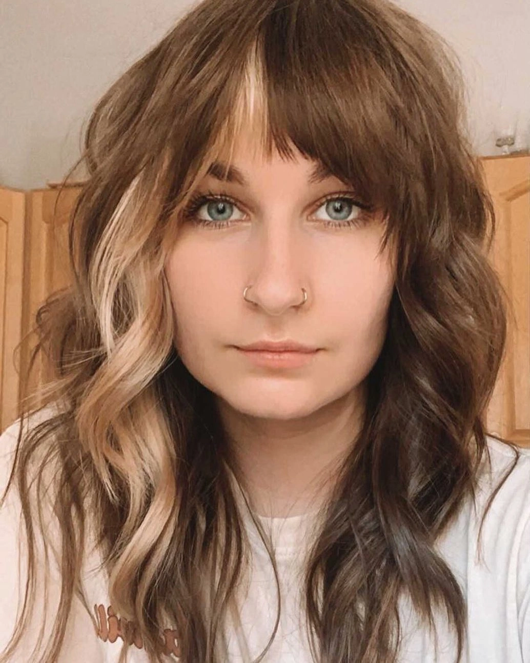 Medium brown waves with beige face framing fringe
